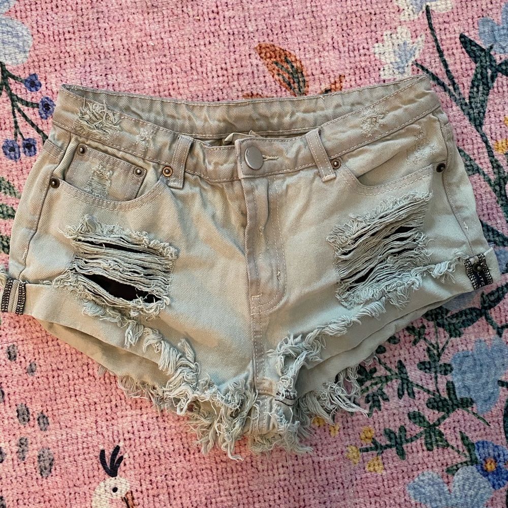 Sage green short shorts.